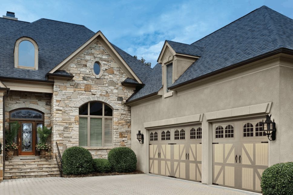 Two-story home with a three-car attached garage.